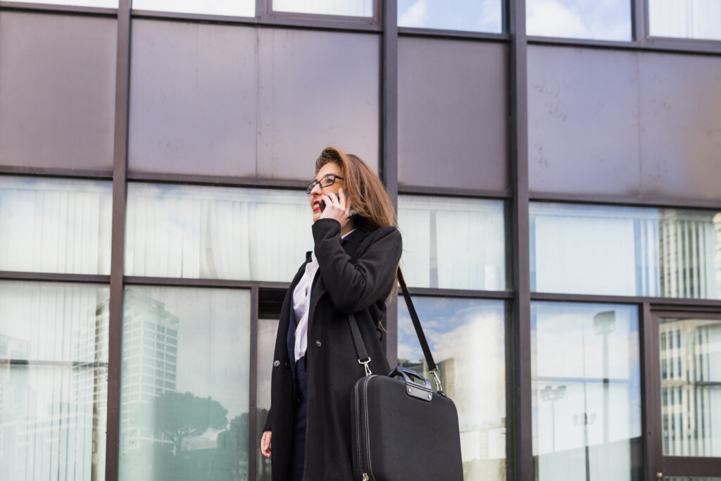 A woman books airport transportation.